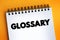 Glossary text quote on notepad, concept background