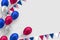 Glossy balloons in colors of American flag.