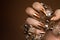 Glossy brown nails