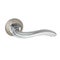 Glossy chrome-plated door handle of an anatomically complex shape for comfortable door opening