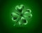 Glossy green clover leaf, vector illustration for St. Patrick day. Isolated four-leaf on green background
