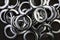 Glossy nickel-plated or chrome-plated Eyelets for attaching curtains in the design workshop