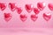 Glossy Pink Heart Balloons Floating Serenely