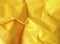 Glossy yellow non-woven fabric texture