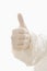 Gloved hand giving thumbs up