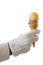 Gloved waiter handing an ice-cream cone