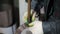 A gloved welder works on a spot welding machine. Chimney welding. An operator works with spot welding to weld a