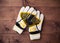 Gloves of the soccer goalkeeper on wooden table