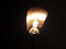 Glow of an electric halogen lamp lamp in the dark