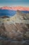 Glowing Badlands and Desert Formation at Zabriskie Point During Sunrise in Death Valley National Park, California