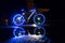 Glowing bicycle is reflected in the water.