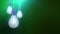 Glowing bulb bulbs falling down hanging on string green background