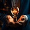 Glowing bulb in CEOs hand signifies business acumen and ingenuity