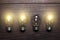 Glowing bulbs weak link concept on wooden