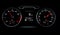 Glowing car dashboards in black and red