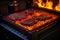 glowing charcoal and flames beneath smart grill grates