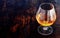 Glowing cognac in an elegant snifter glass