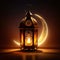 Glowing decorated lantern on a background of half moon, dark background. Lantern as a symbol of Ramadan for Muslims