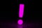 Glowing exclamation mark of violet color