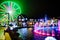 Glowing Farris Wheel And Fountain