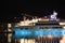 Glowing ferries in night Bay