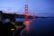 Glowing Golden Gate Bridge and Fort Point