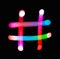 Glowing hash # symbol on dark background. Hashtag markup. Abstract night light painting. Creative artistic colorful bokeh.