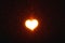 glowing heart light with shiny particles