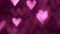 Glowing heart shaped lights sparkling on soft pink background. Romantic Valentine`s day background