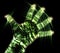 Glowing kirlian aura photography with green corona of a male human hand