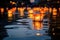 glowing lanterns floating on water at dusk
