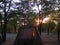 GLOWING LIGHT OF SETTING SUN FALLING ON BACK OF TENT IN CAMP IN AFRICAN WILDERNESS