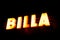 Glowing logo of Billa grocery chain on the Elan shopping mall in Havirov, Czech Republic at night