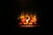 Glowing Logs in a Fireplace