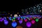 Glowing multi-colored balls, a festive decoration of the city