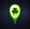 Glowing neon Balloon with clover trefoil leaf icon isolated on brick wall background. Happy Saint Patricks day. National