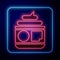 Glowing neon Cream or lotion cosmetic tube icon isolated on blue background. Body care products for men. Vector