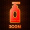 Glowing neon Cream or lotion cosmetic tube icon isolated on brick wall background. Body care products for men. Vector