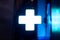 Glowing neon Cross hospital medical icon. First aid. Diagnostics symbol. Medicine and pharmacy sign.