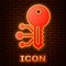 Glowing neon Cryptocurrency key icon isolated on brick wall background. Concept of cyber security or private key
