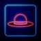 Glowing neon Elegant women hat icon isolated on blue background. Vector Illustration