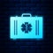Glowing neon First aid kit and Medical symbol of the Emergency - Star of Life icon isolated on brick wall background