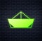 Glowing neon Folded paper boat icon isolated on brick wall background. Origami paper ship. Vector