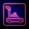 Glowing neon Lawn mower icon isolated on black background. Lawn mower cutting grass. Vector