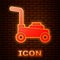 Glowing neon Lawn mower icon isolated on brick wall background. Lawn mower cutting grass. Vector