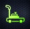 Glowing neon Lawn mower icon isolated on brick wall background. Lawn mower cutting grass. Vector