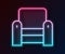 Glowing neon line Armchair icon isolated on black background. Vector