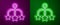 Glowing neon line Baby crib hanging toys icon isolated on purple and green background. Baby bed carousel. Vector