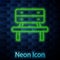 Glowing neon line Bench icon isolated on brick wall background. Vector