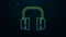 Glowing neon line Headphones icon isolated on black background. Support customer service, hotline, call center, faq